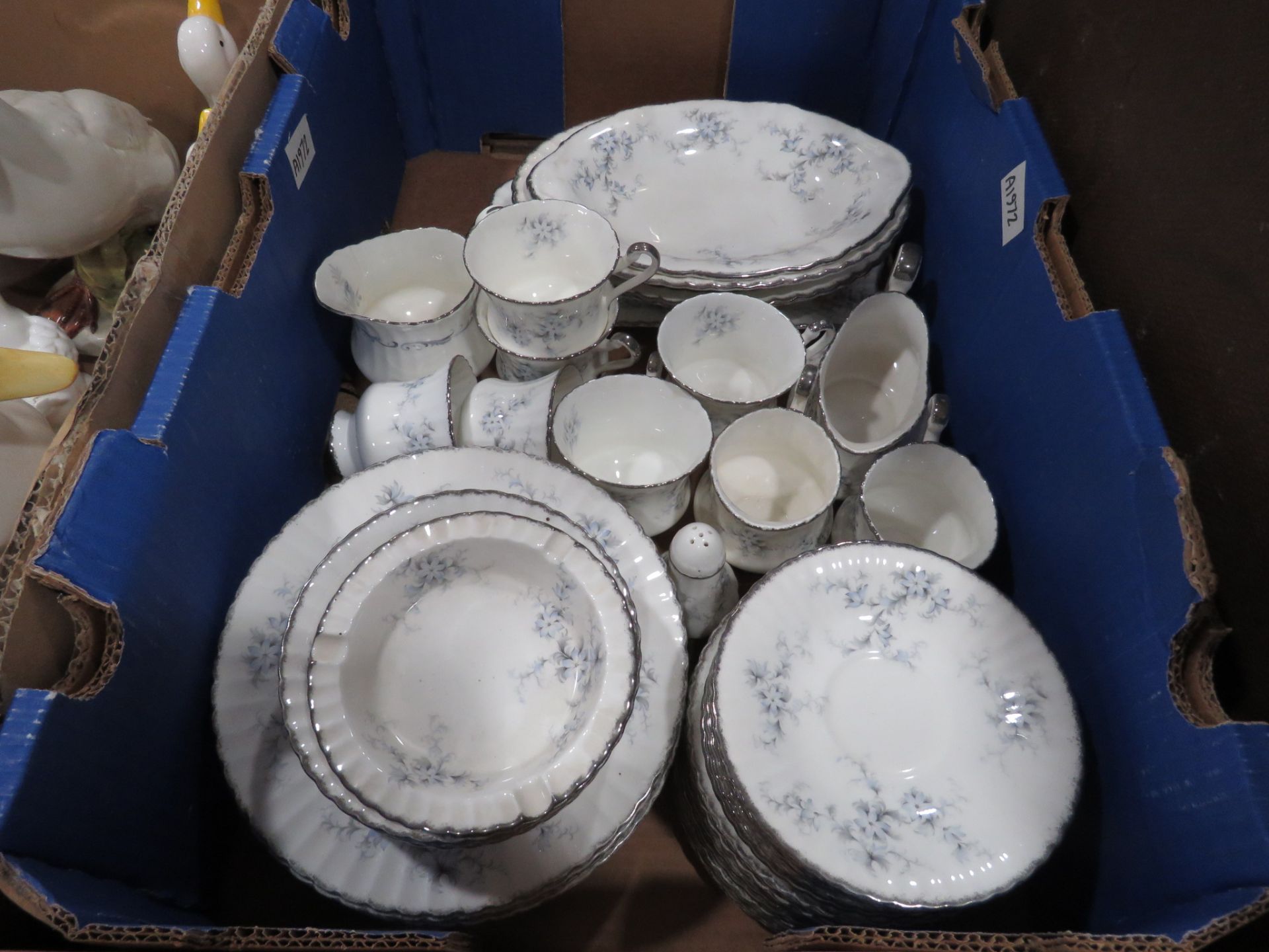 Box containing a quantity of Paragon brides choice patterned crockery