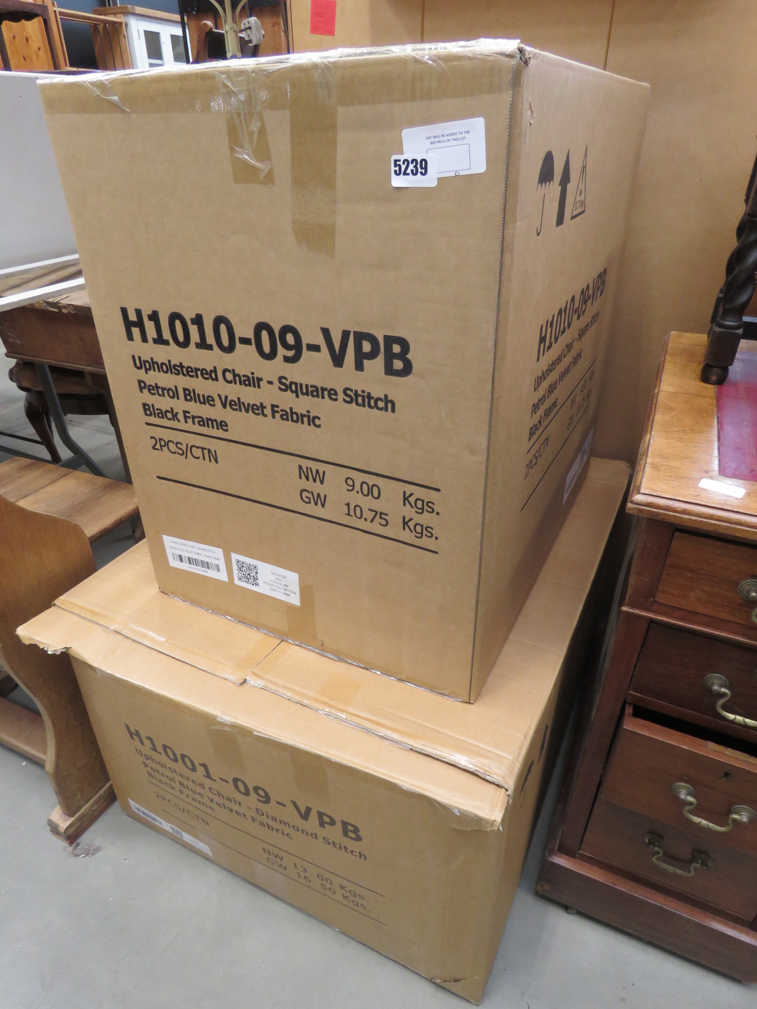 2 boxes containing chair parts (af)