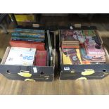 2 boxes containing a quantity of novels, cartoon and reference books