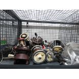 Cage containing a quantity of fishing reels