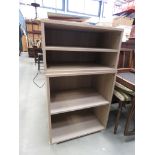 2 pale oak finished bookcases