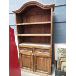 Rustic pine open bookcase with cupboards and drawers under