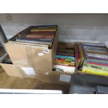 4 boxes containing a large quantity of childrens annuals
