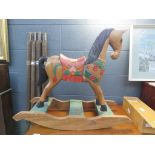 Poly-chrome rocking horse