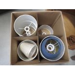 Box containing lamp shades