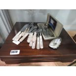 quantity of loose cutlery plus a cutlery box