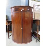 Georgian mahogany bow fronted corner cabinet