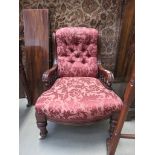 Victorian mahogany armchair with red floral upholstery
