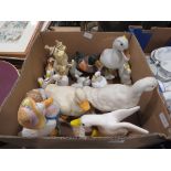 Box containing a quantity of ornamental ducks