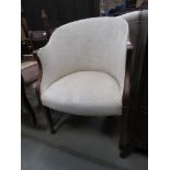 Cream upholstered oak tub chair