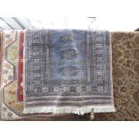 Kilim style mat plus a Bokhara style mat with pink border