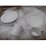 Box containing Royal Doulton Simply Platinum patterned crockery