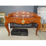Continental style leather topped desk with ormolu decoration