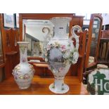 Pair of ornate vases with floral decoration