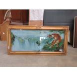 Print behind glass of a tiger and waterfall in gilt frame