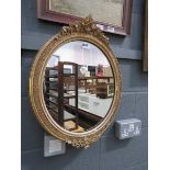 5094 Oval mirror in decorative gilt frame