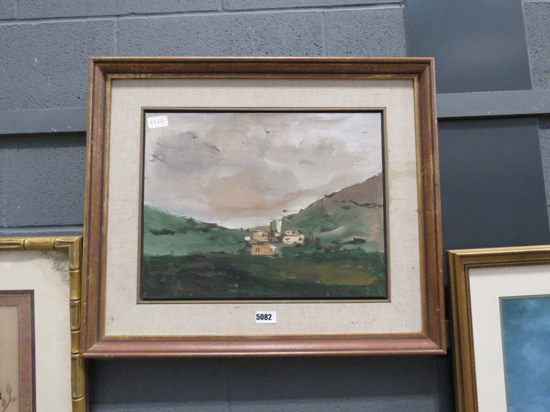 Oil on board of green hills and buildings