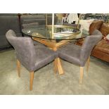 Circular glazed turin dining table with four grey suede effect chairs