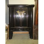 Chinese inspired double door cabinet on raised supports