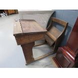 Oak child's desk with attached seat