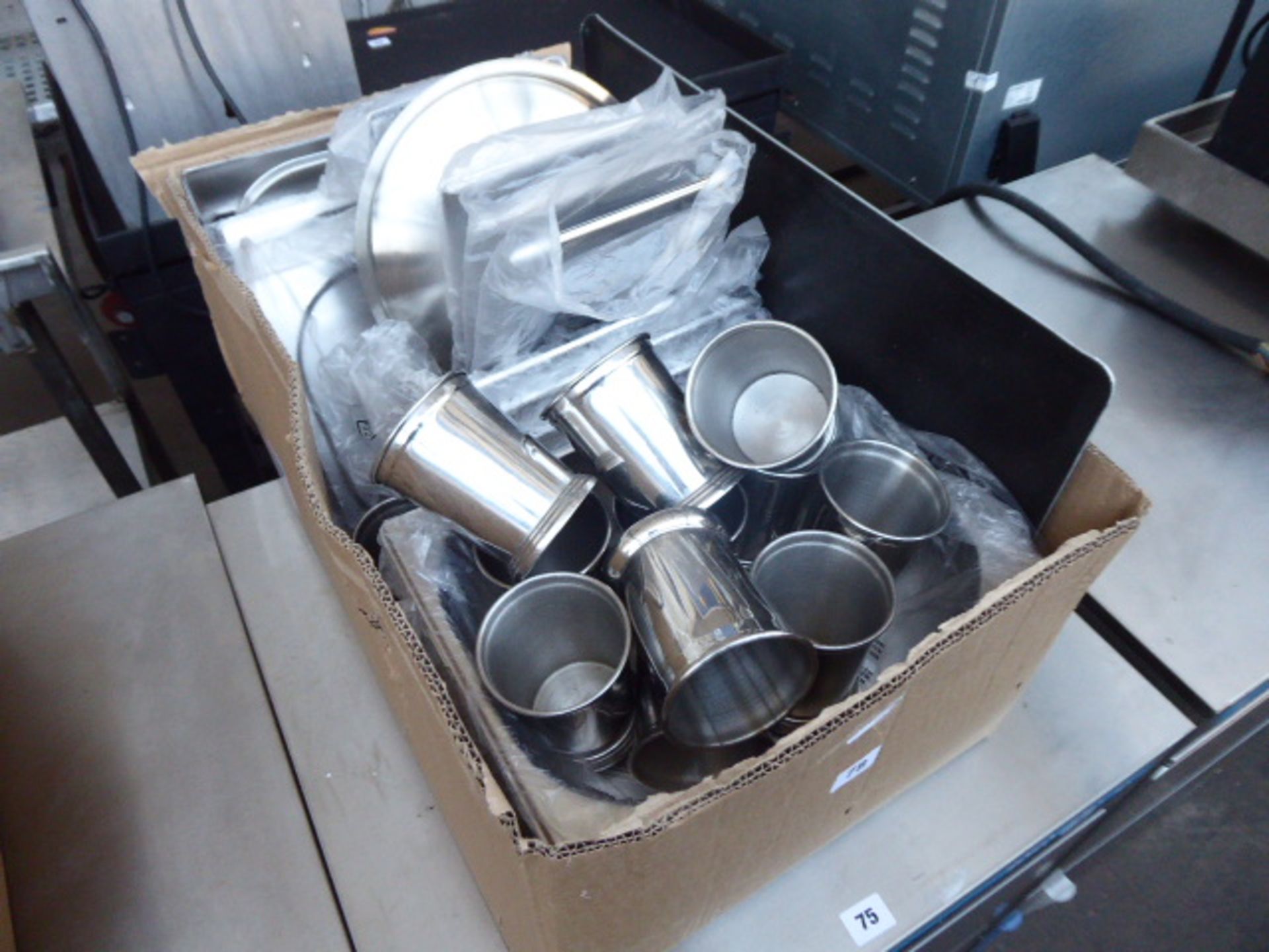 Large box containing assorted stainless steel gastronorms, lids, trays, tankards