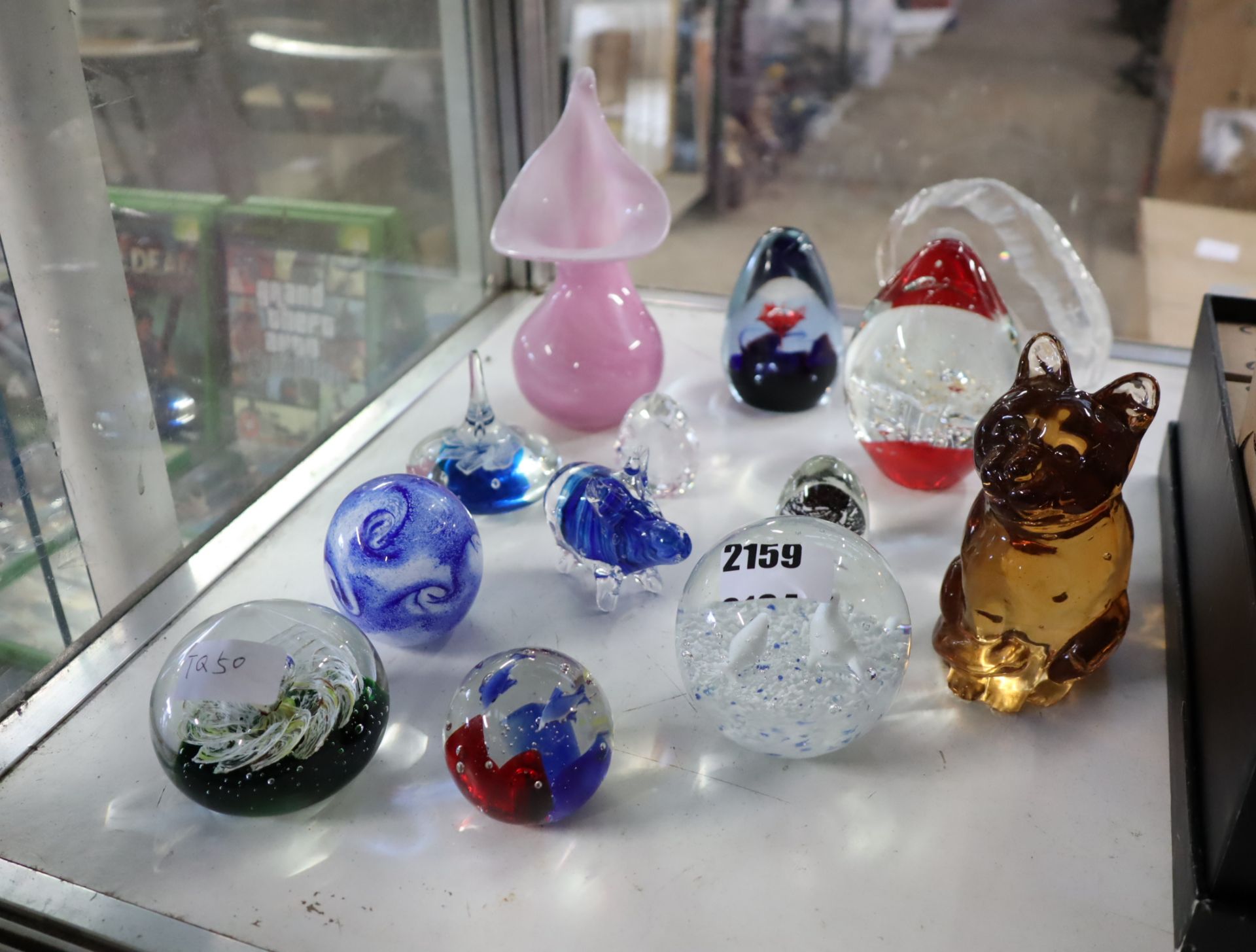 Quantity of glass paperweights and ornaments