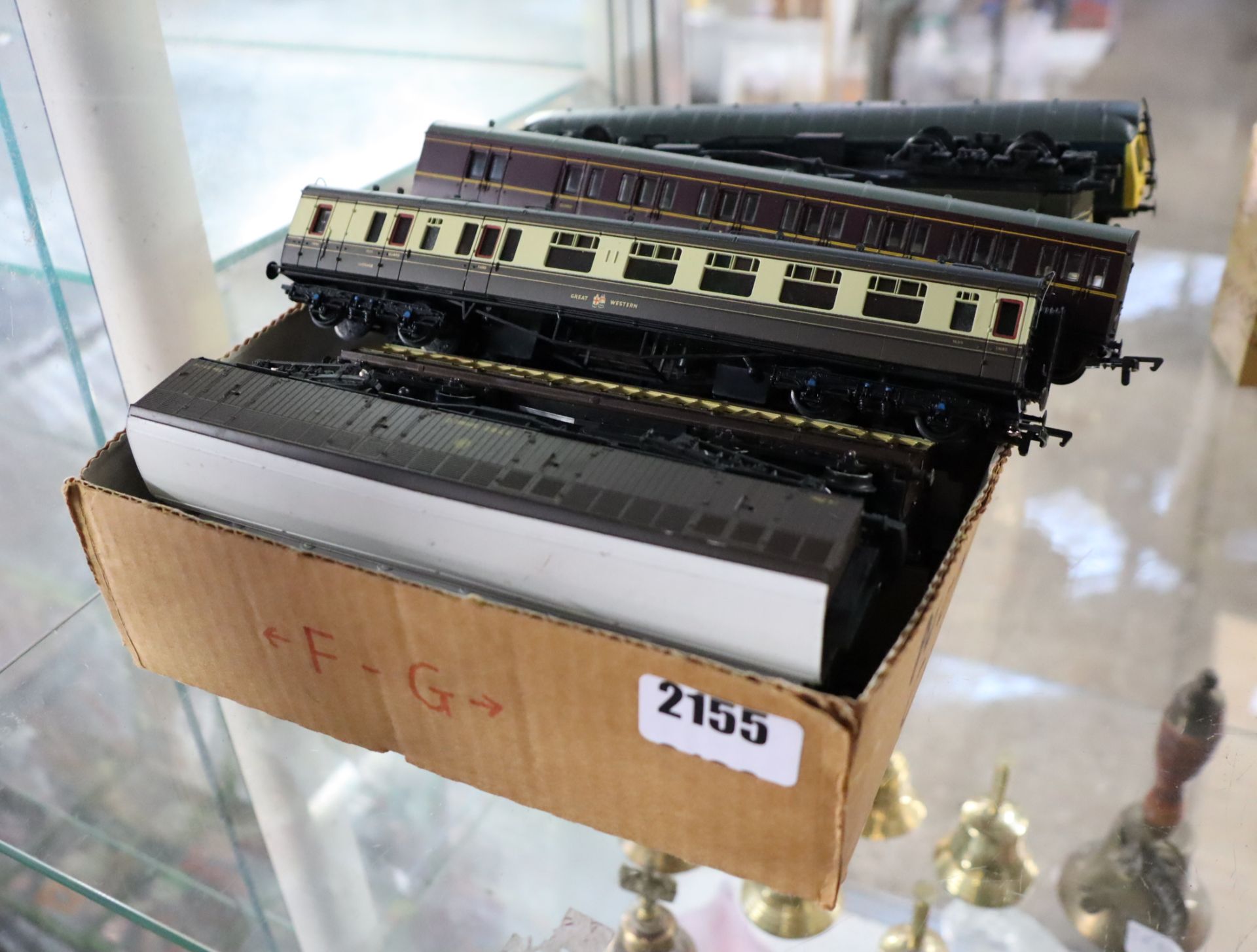 Box of model railway carriages