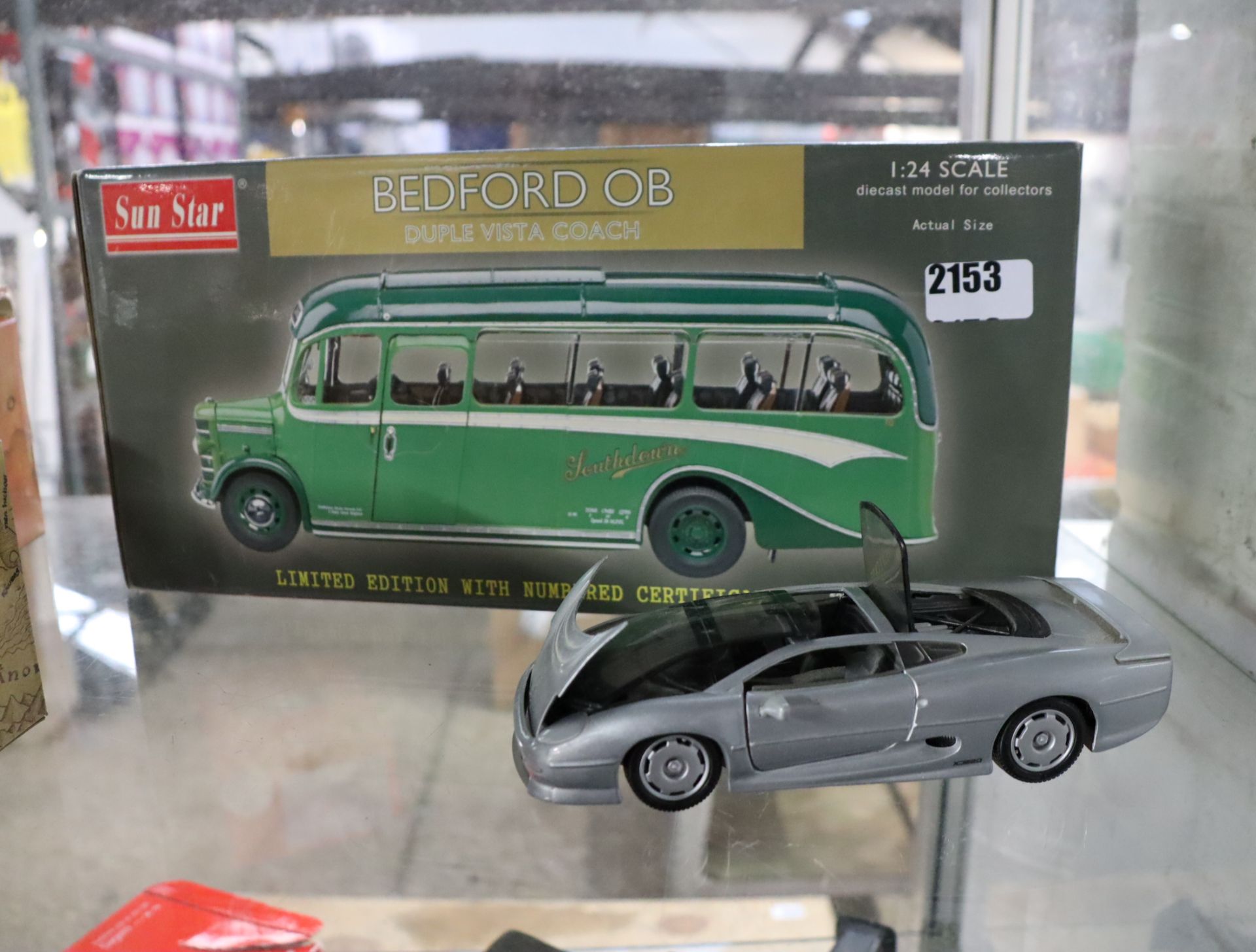 Boxed model of Bedford OB Duple Vista coach by Sun Star, 1:24 scale with smaller model of Jaguar