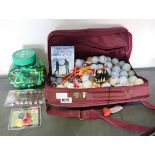 Bag containing mixed branded used golf balls with quantity of golfing tees