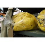 Bag containing 10 ladies weatherproof jackets in yellow