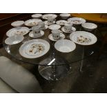 2117 Circular glass topped pedestal table