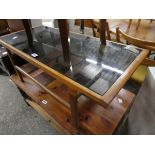 Glass topped wooden coffee table