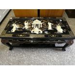 Oriental black and mother of pearl inlaid coffee table with shelf under on ball and claw feet