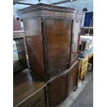 Serpentine front drinks cabinet with drawers and cupboard under