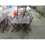 Wooden square topped folding garden table, with 4 matching chairs