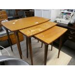 Nest of 3 teak tables with spindle supports