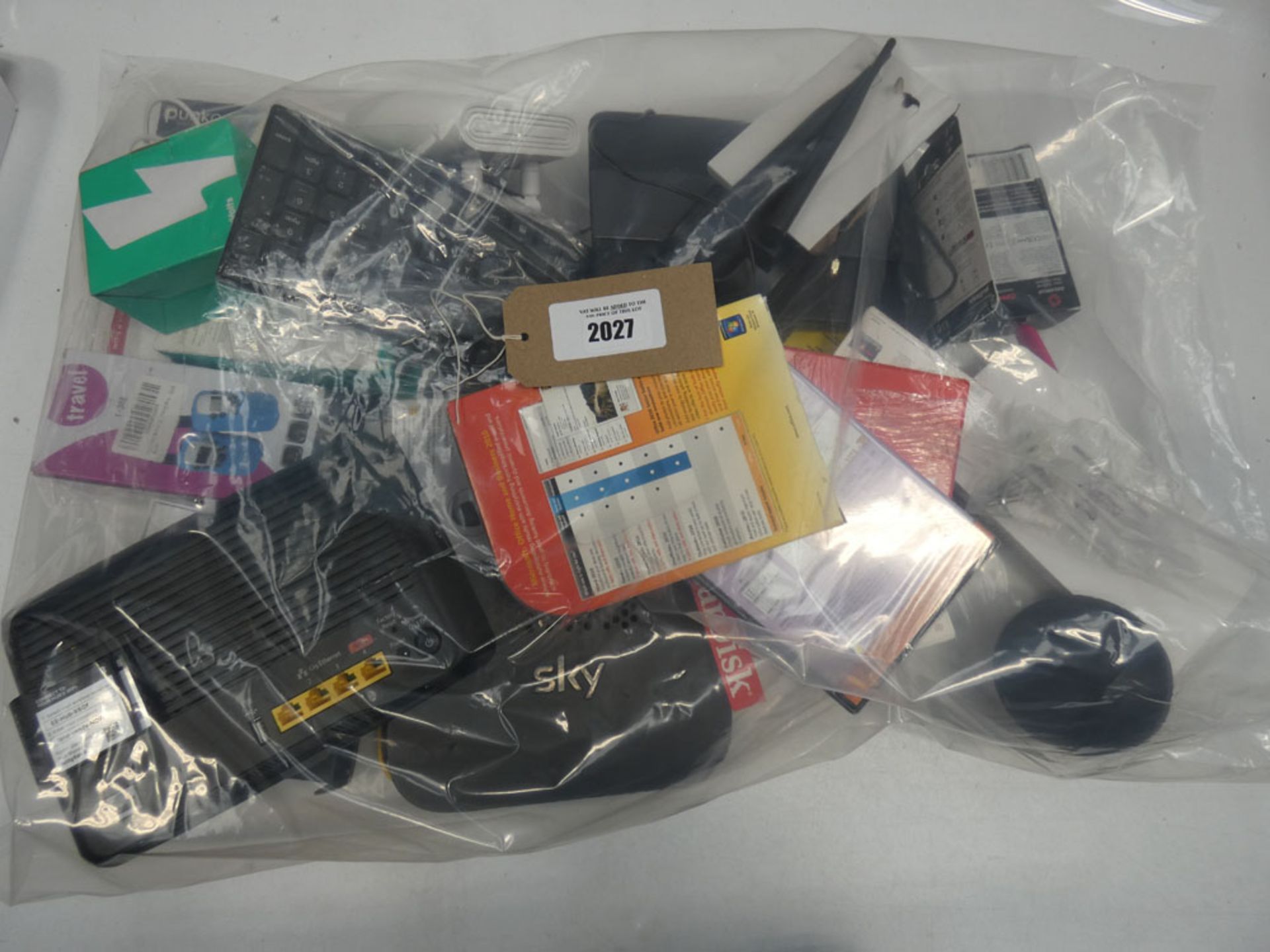 Bag containing routers, adapters, software, SD cards, etc