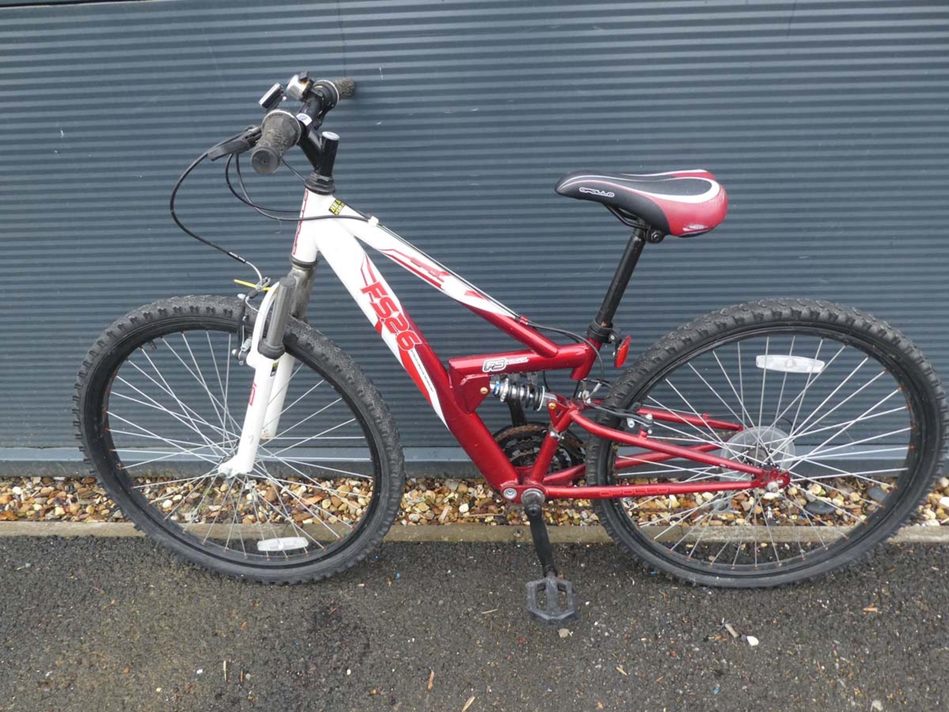 Apollo FS26 red and white mountain bike