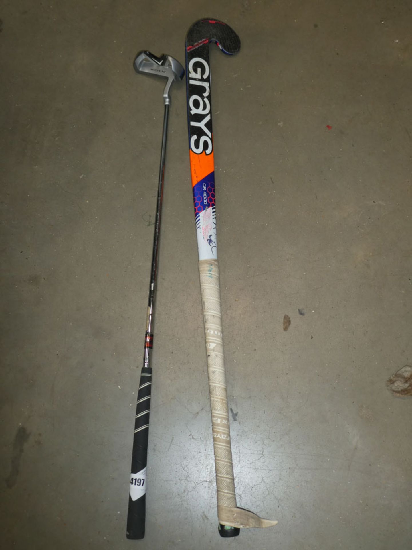 Hockey stick and Dunlop putter