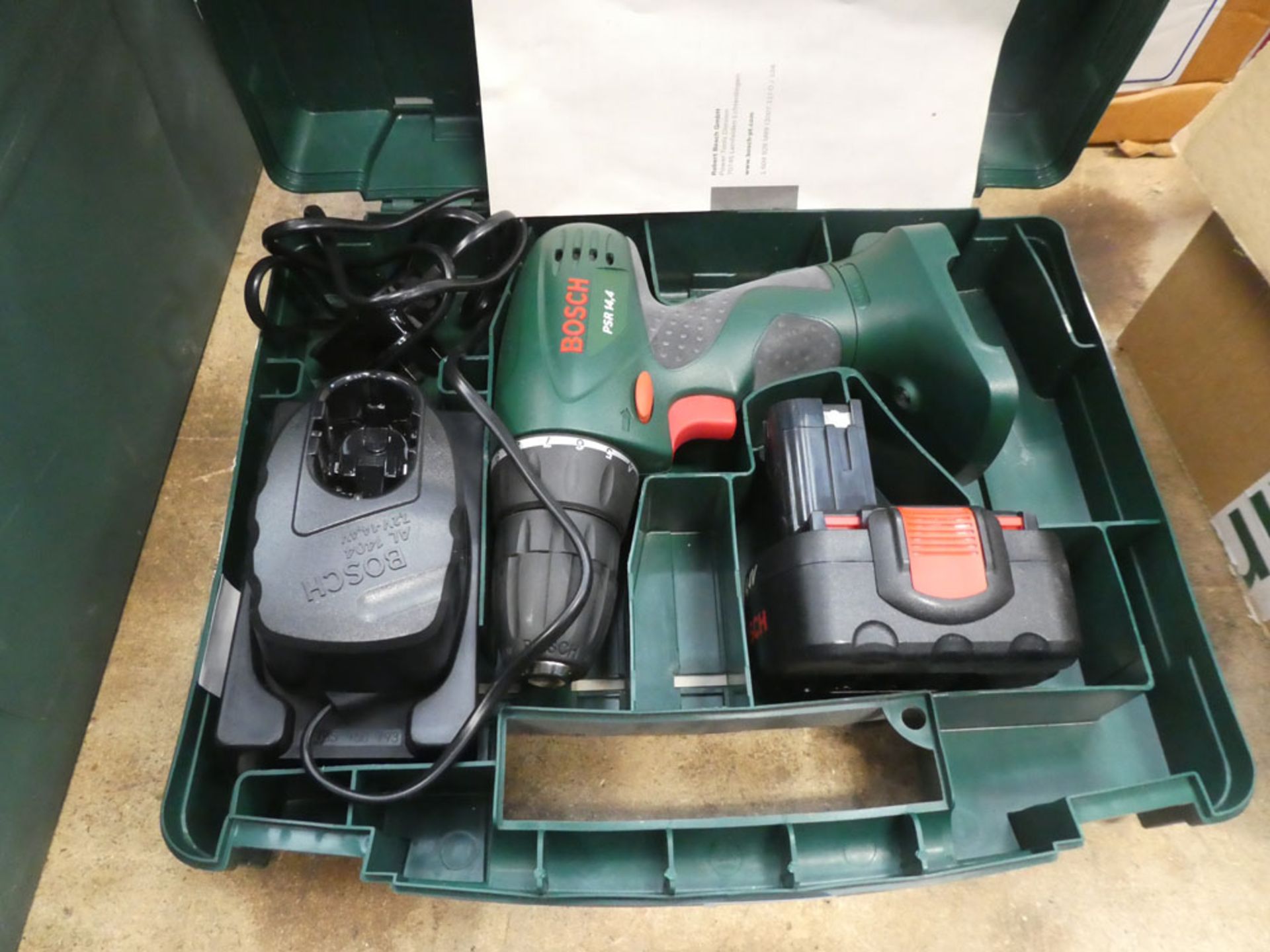 Small Bosch battery powered drill with one battery and charger