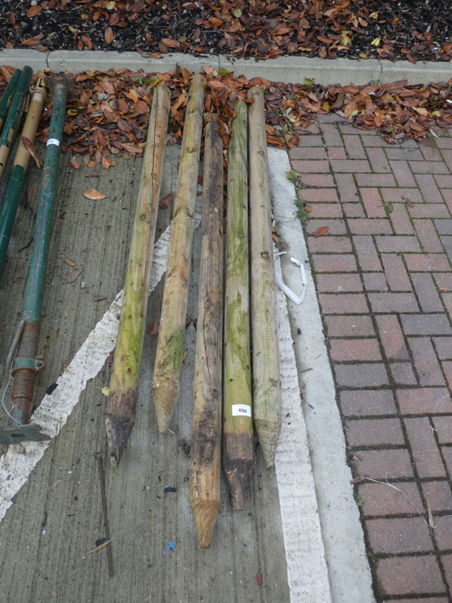 5 wooden posts