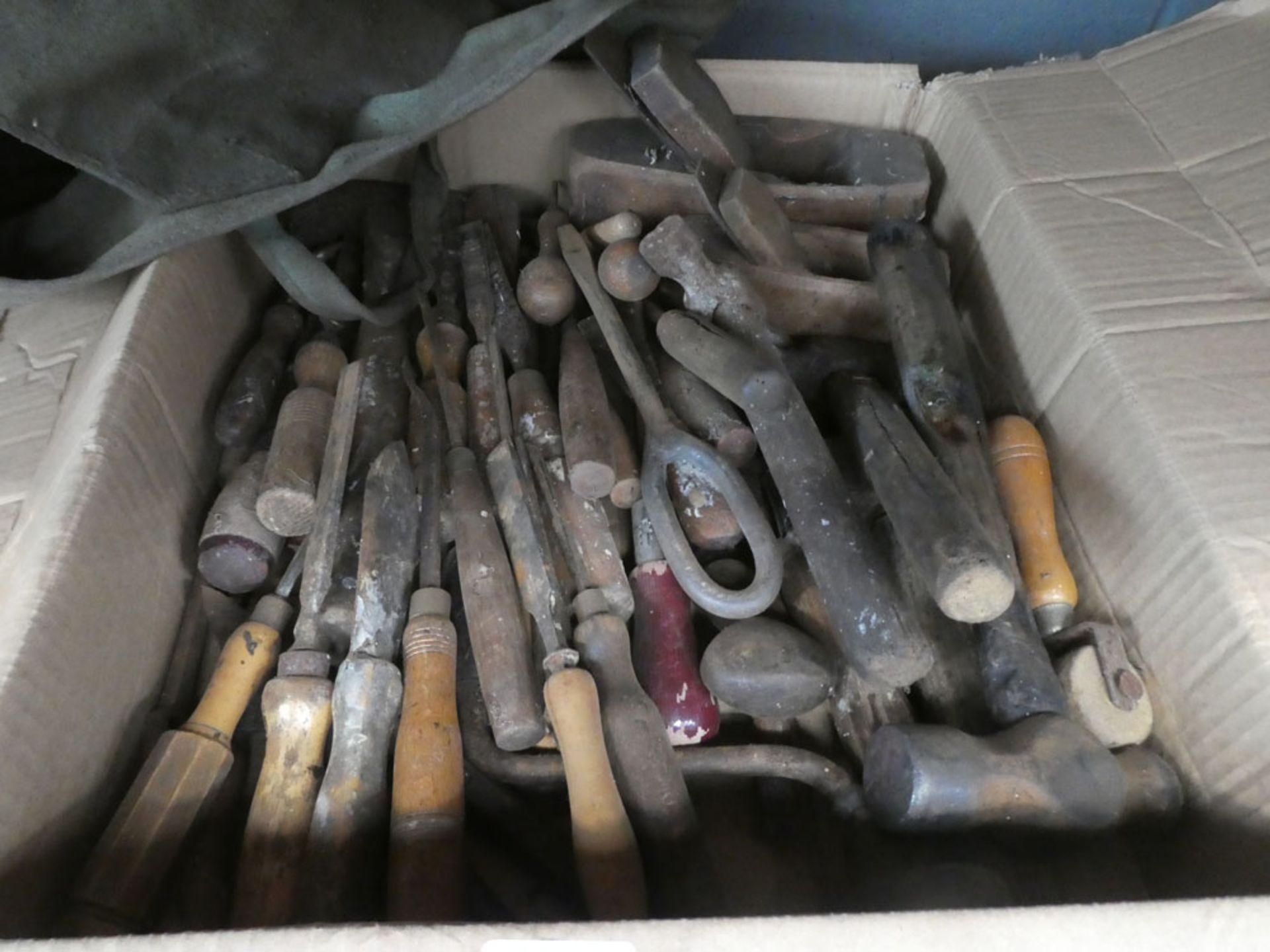 Box of various hand tools including carpenters chisels, planes and various other items