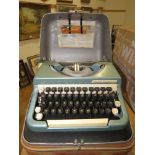 2 cased vintage typewriters