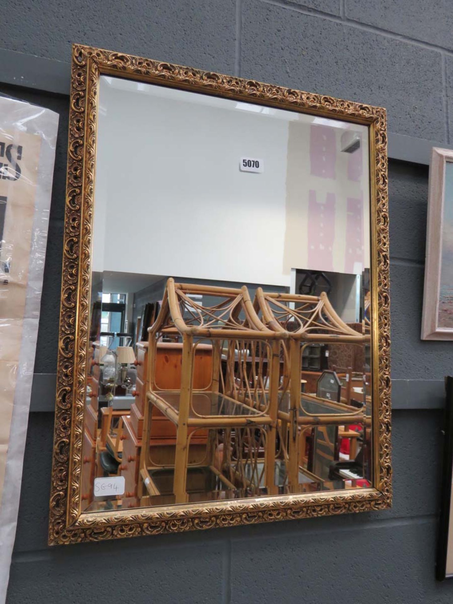 Rectangular bevelled mirror in gilt frame