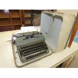 Cased Olympia typewriter