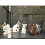 Cage containing ornamental French bulldogs