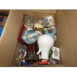 Box containing an alarm clock, glassware, playing cards and china