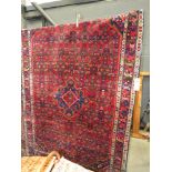 (2) Woolen Afghan carpet with red background and floral pattern