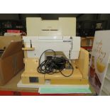 5620 - Cased Riccar electric sewing machine