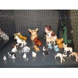 Cage containing ornamental French bulldog figures